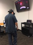 Student using the HTC Vive virtual reality system during the Frisco Campus Makerspace Grand Opening- 2017
