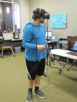 Student exploring virtual systems at our VR Workshop- April 2019