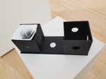 Neal Cox- Interior Cube Camera. Book board, book cloth, metal, paper, 2008